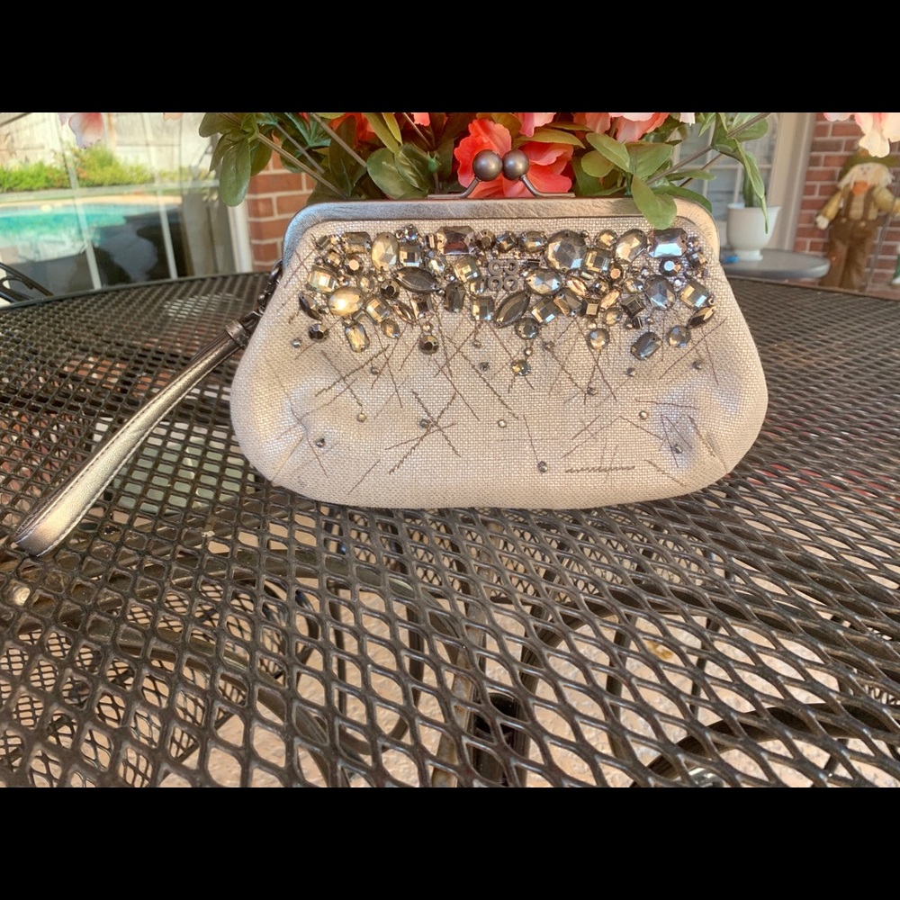 Silver Coach clutch/wristlet